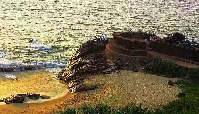 The stunning Bekal Fort with the background of colorful sunset at Bekal in Kerala